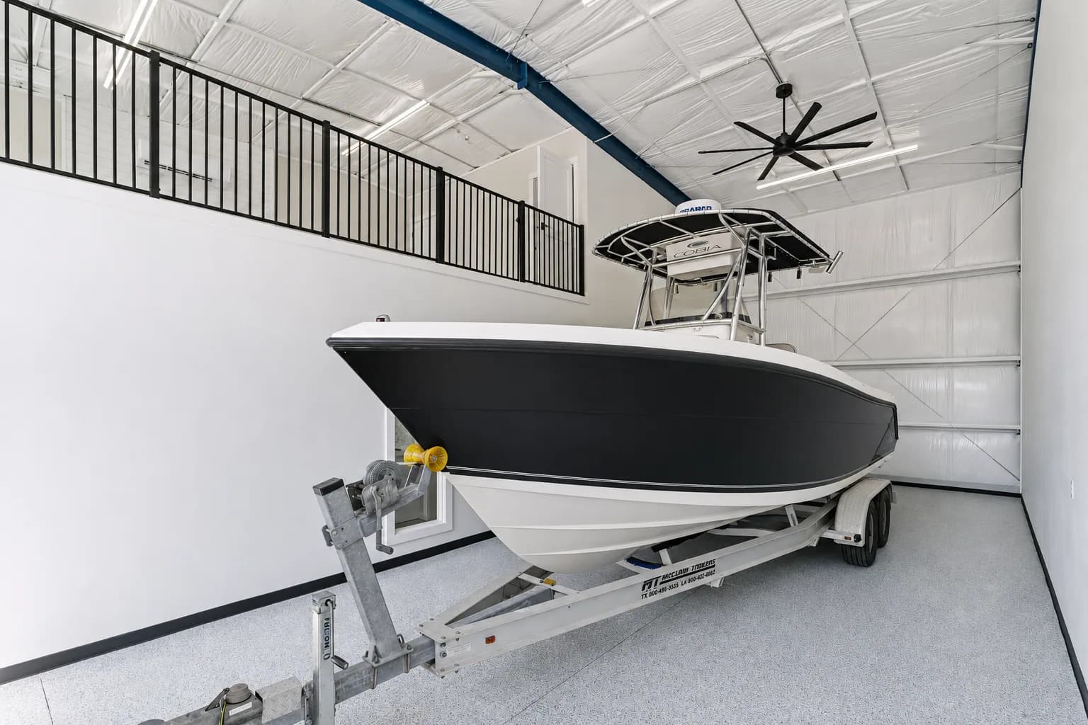Boat parked inside the finished 40-foot SIDE BY SIDE® garage