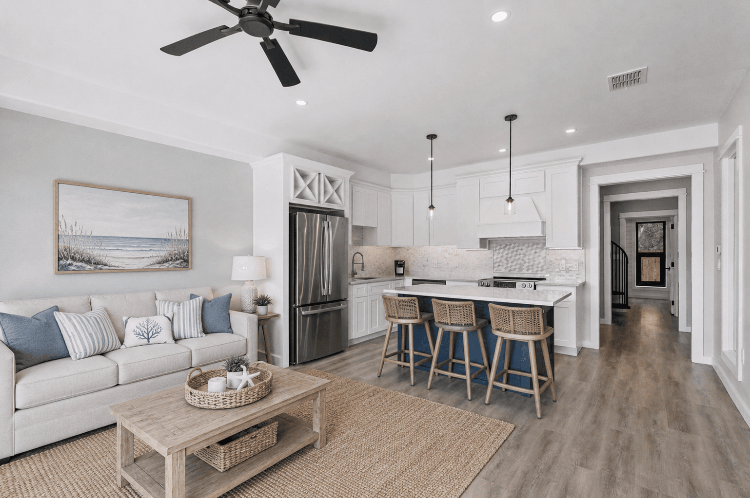 The finished living suite beside the garage, virtually staged