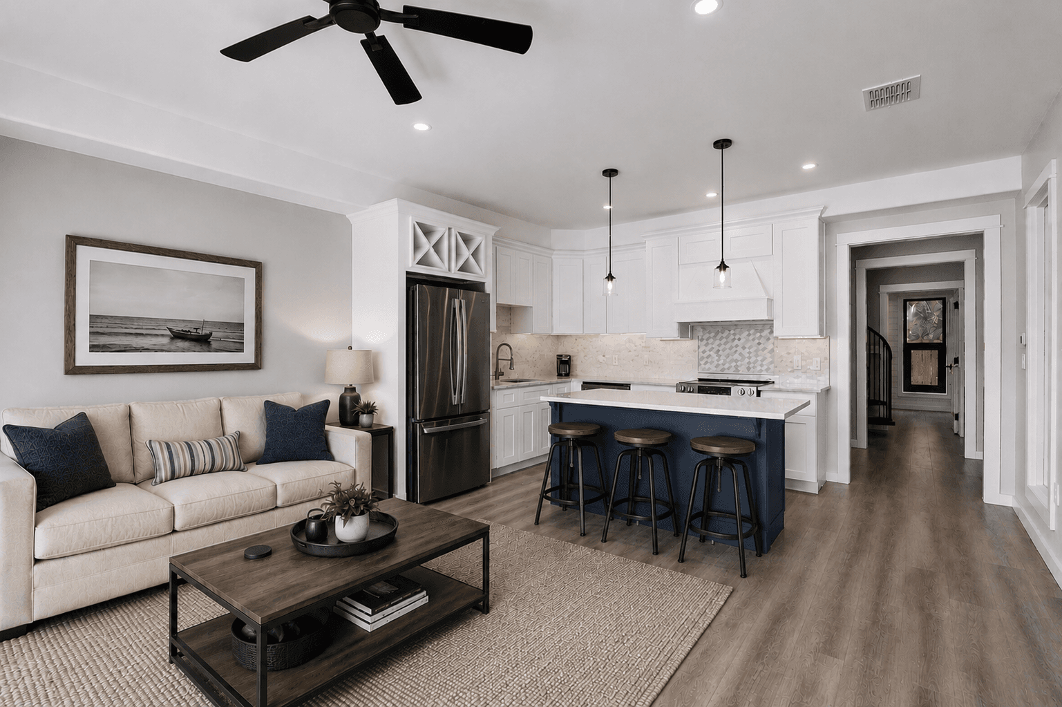 Suite interior: the open kitchen and living area, virtually staged